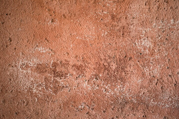 A grungy brick wall texture as background.