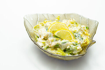 Delicious and fresh salad with savoy cabbage and spring greens in a smooth creamy sauce