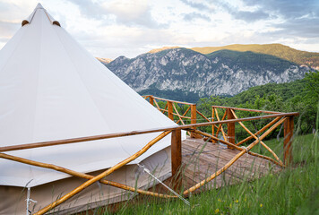 glamping tent detail with mountain range panorama