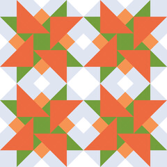 Seamless vector pattern in geometric triangle red,green,orange.Abstract mosaic background. Design elements.