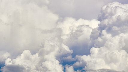 Naklejka na ściany i meble White porous clouds on the blue sky, cloudy landscape.