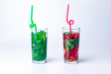 Cocktail isolated on white background. Lemon, lime and raspberries cocktail.