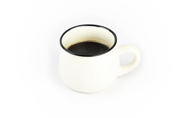 Coffee cup. Vintage style white clay cup with black coffee isolated on white background.