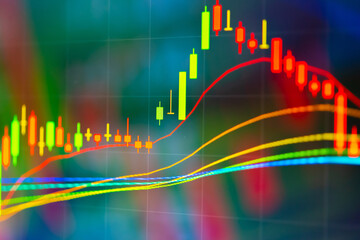 Fototapeta premium Stock market data on digital LED display. A daily market price and quotation of prices chart and candle stick tracking for Forex trading. Financial data on the digital screen as concept.
