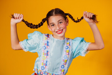 Child in typical clothes of famous Brazilian party called 