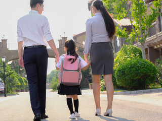 Young parents send their children to school
