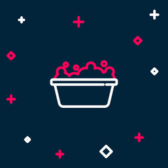 Line Baby bathtub with foam bubbles inside icon isolated on blue background. Colorful outline concept. Vector
