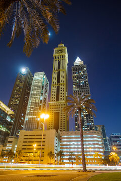 Dubai, UAE – April 18, 2021: night view on skyscrapers Hotel Grand Mercure Majlis, The Tower, Capricon Tower, Maze Tower