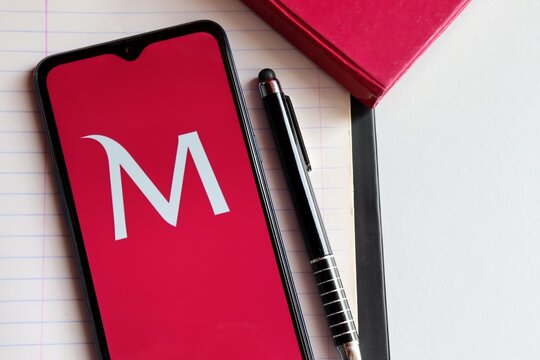 Bahia, Brazil. November 6, 2020: Millennium Bcp Bank App on smartphone screen on office desk. Portuguese Bank. App Millennium. Private bank from Portugal.