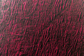 Dark red and burgundy grunge texture and surface background backdop close-up