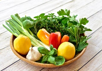 Fresh green herbs for preparing and cooking healthy Mediterranean or Italian diet. Food background, lifestyle, close-up, copy space