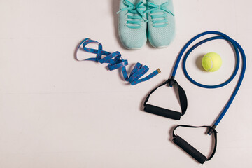 Athlete's set. Female fitness exercise concept. Flat lay, top view, copy space. sports equipment