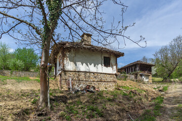Typical street and old houses at historical village of Bozhentsi, Bulgaria