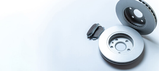 Sapre parts. Auto motor mechanic spare or automotive piece on white background. New metal car part. Repair and vehicle service with space for text.