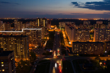 Fototapeta na wymiar Aerial night view of residential area in Dolgoprudny city