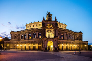 Fototapeta na wymiar Semper Opera House, Dresden, Germany in blue hour, lited by yellow lights
