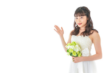 ブーケを持ち指差す花嫁の女性