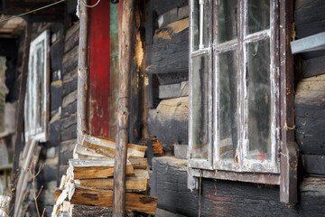 Fototapeta na wymiar Old shutters on a wooden house.