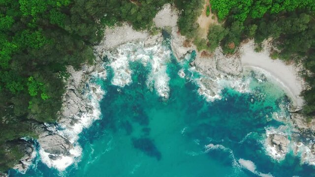 View from above. Far Eastern Marine Reserve. The camera hovers over a beautiful rocky coastline with a turquoise sea.