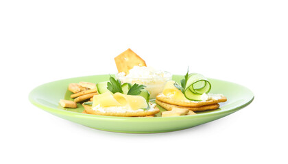Delicious crackers with cream cheese, cucumber and parsley on white background