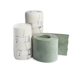 Medical bandage rolls on white background. First aid items