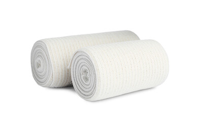 Medical bandage rolls on white background. First aid items