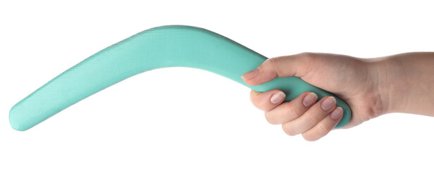 Woman holding turquoise boomerang on white background, closeup