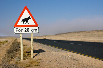Warning sign for brown hyenas on highway, Namibia