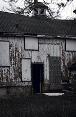 Fototapeta na wymiar An abandoned old house with dark colors