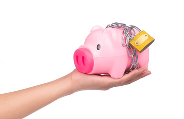 hand holding Piggy bank style money box chained together isolated on white background, concep...