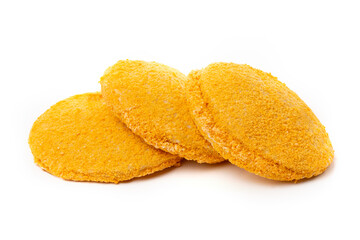 Chicken nuggets or yellow cutlets, isolated on a white background.