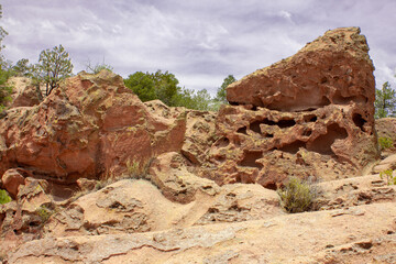 Huaco geologic rock formations in arid desert landscape in the Santa Fe National Forest between Santa Fe and Albuquerque