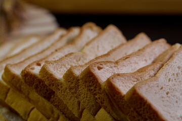 closeup the loaf of sliced wholewheat bread
