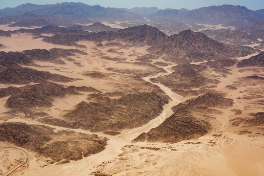 Beautiful aerial view landscape of mountains peaks in desert. Mountains in the desert, aerial view