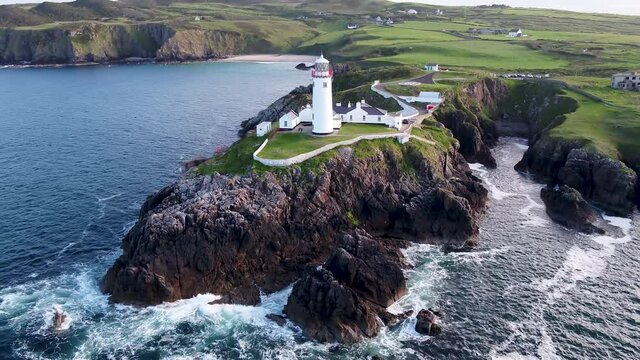 Aerial View of Fanad Head Lighthouse Donegal County, Ireland. Landmark From 19th Century on Steep Sea Cliffs