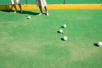 People playing lawn bowls together