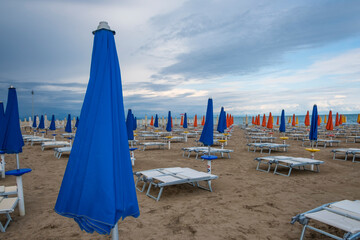 Beach resort with sun beds and beach umbrellas