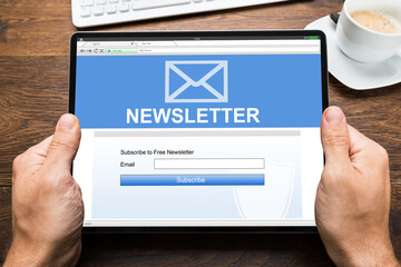 Person Hands With Digital Tablet Showing Credit Score