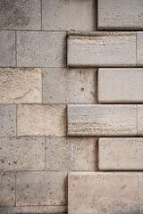 Stone wall patterns in an alleyway in Paris, France