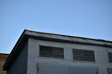 Gray garage room in the city with bars