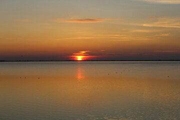 Wadden Sea: Sunset over Langeoog Island with rising tide
