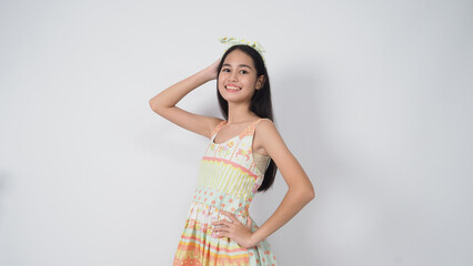 Asian Young woman gesture posing on white background. represent cheerful and confident. Showing gestures such as mini heart Okay Thumb up or point out. Happy amazed excited and surprised. 