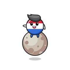 illustration of netherlands flag badge cartoon sitting on the moon