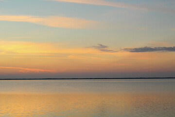 Fototapeta na wymiar Wadden Sea: the sunset over the island of Langeoog - a play of colors