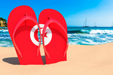 Flip flops with Tunisian flag on the beach. Tunisia resorts, vacation, tours, travel packages concept. 3D rendering