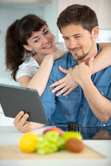 Fototapeta premium adult couple cooking together at home