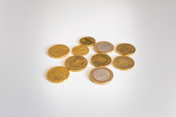 Euro coins change on a white table. Money concept.