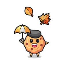 cartoon of the cute chocolate chip cookie holding an umbrella in autumn
