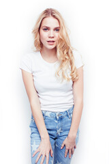 Fototapeta premium young pretty stylish blond hipster girl posing emotional isolated on white background happy smiling cool smile, lifestyle people concept