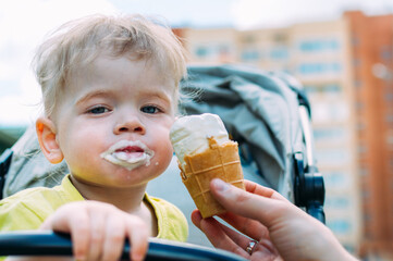 Portrait of a child with ice cream close up